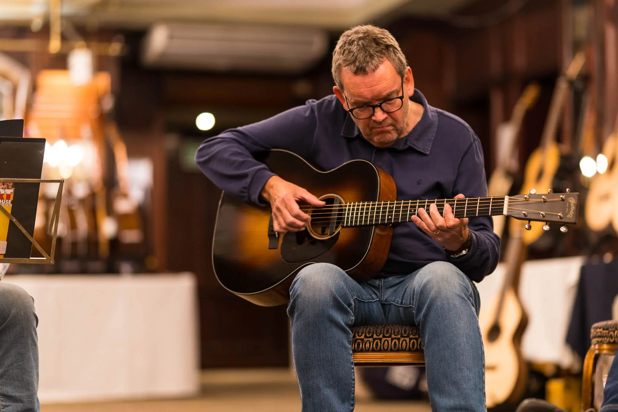 Richard Knott playing a Martin guitar with a nice sunburst shaded top